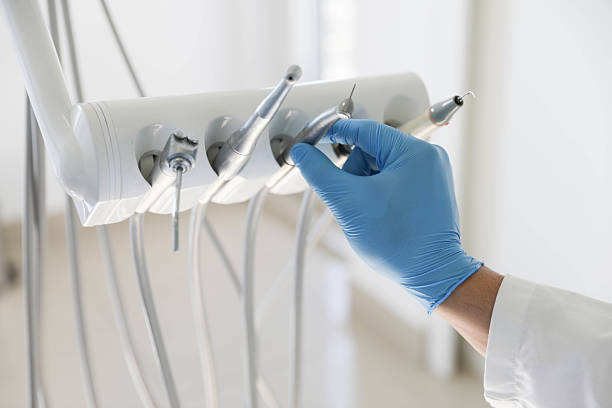 Professional Tooth Extraction technician working in Jamesburg, NJ